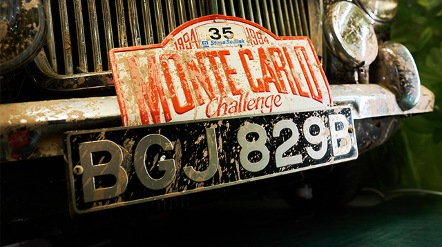 Close up of the reg plate of the 1963 MG 1100 and the Monte Carlo Challenge plate